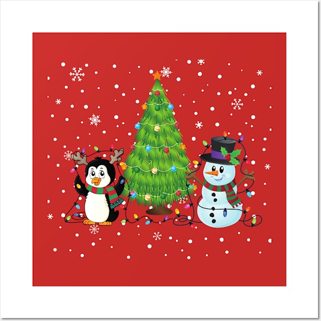 SNOWMAN AND PENGUIN DECORATING THE CHRISTMAS TREE Wall Art by KutieKoot T's